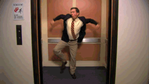 Ed Helms dancing in an elevator gif