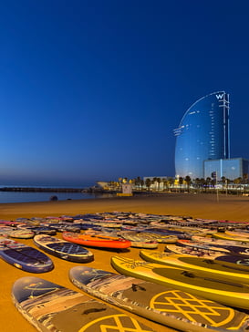 Roop Nijjar-Paddleboarding in the mediterranean at the Barceloneta beach infront of the W Barcelona